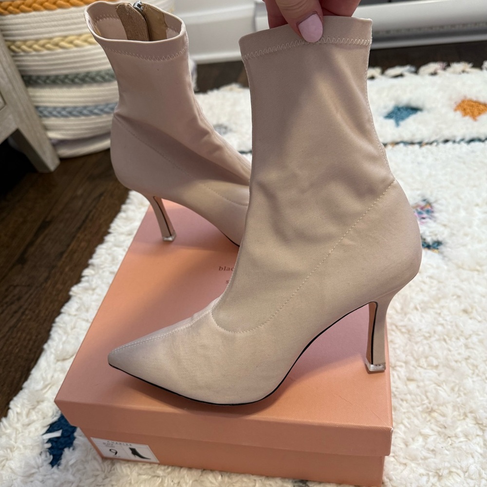 Black Suede Studio heel boot style